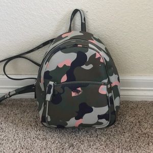 Guess mini backpack.